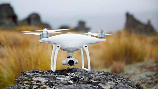 The All New DJI Phantom 4 - The Smartest & The Sexiest Flying Gadget Ever!