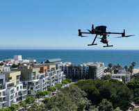 Santa Monica Police Department's DJI Matrice 300 hovering over the city in a Drone as First Responder (DFR) Use Case