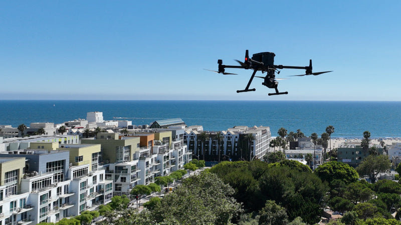 Santa Monica Police Department's DJI Matrice 300 hovering over the city in a Drone as First Responder (DFR) Use Case