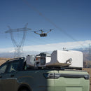 A DJI Dock 3 mobile deployment from the back of a truck