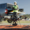 A drone pilot is piloting the Freefly Astro Max in the field