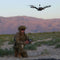 A military operator flying the Teal Black Widow sUAS in an arid mountainous area