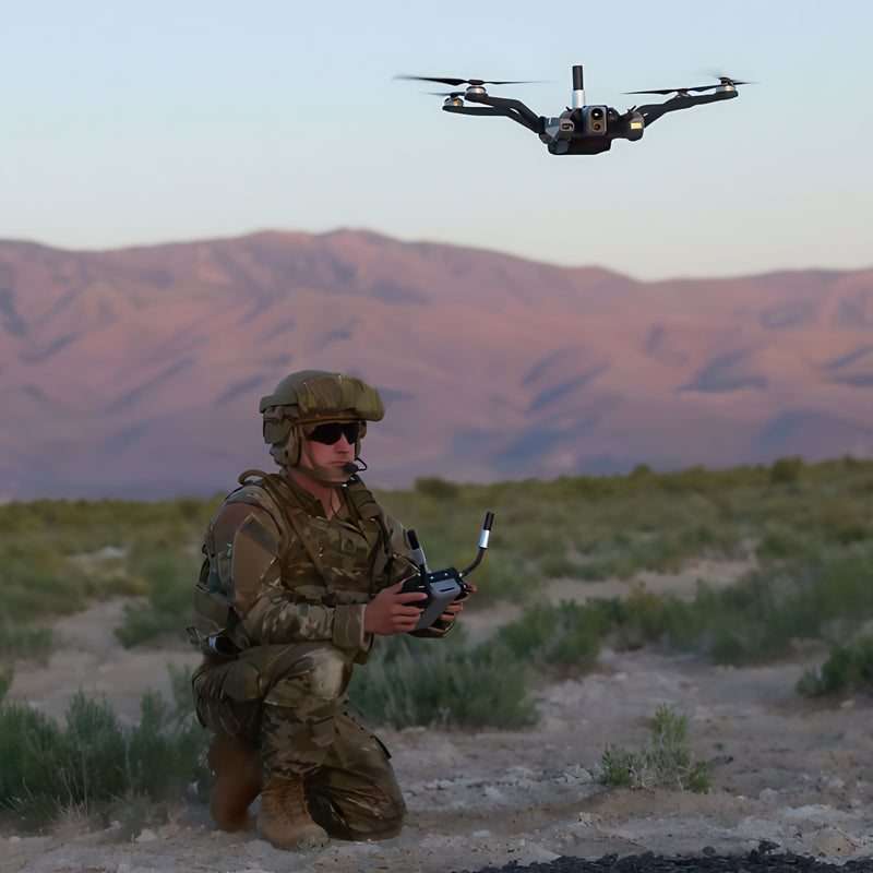 A military operator flying the Teal Black Widow sUAS in an arid mountainous area