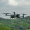 ACSL SOTEN flying in a forested area