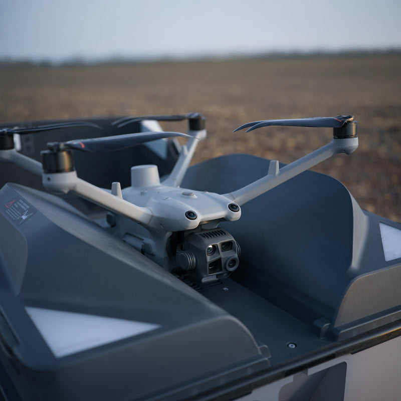 A DJI Matrice 4TD sitting on a Dock 3 ready for deployment