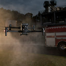 DJI Matrice 30T Thermal Drone responding to a fire. Next to a fire truck.