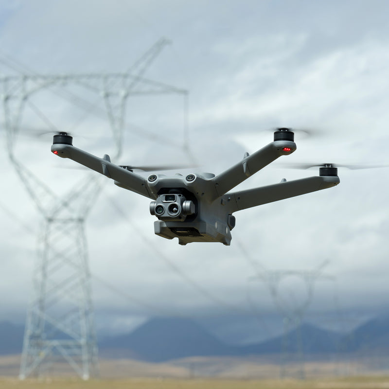 DJI Matrice 3TD autonomous thermal drone for DJI Dock 2 flying near power lines.
