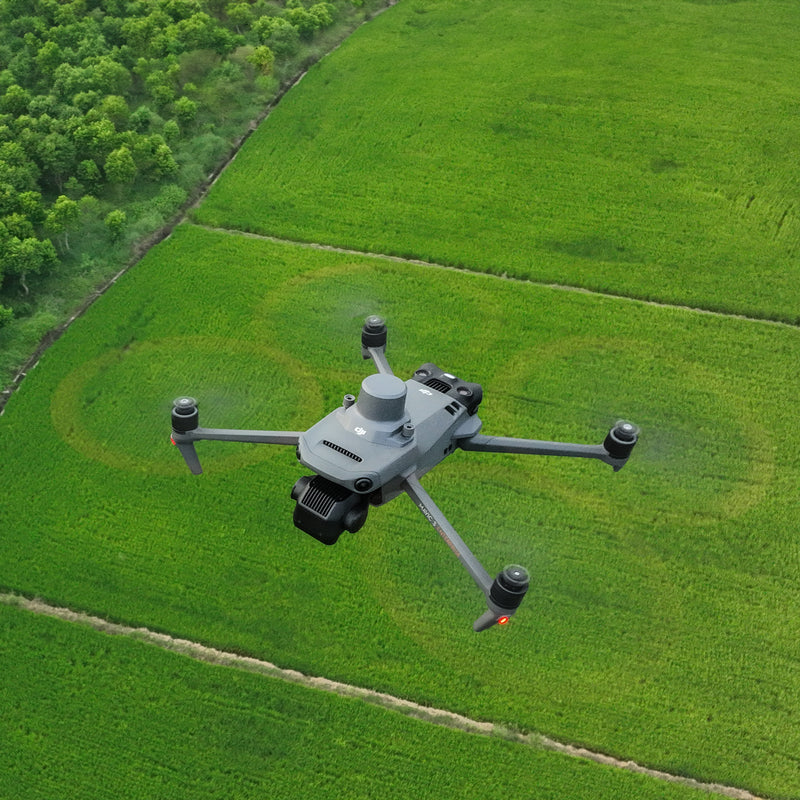 DJI Mavic 3 Multispectral flying over crops