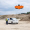 Drone pilot launchiing WingtraRAY fixed-wing drone to do volumetric measurements of aggregate stockpiles