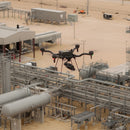 Freefly Astro flying above a refinery
