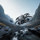 Two DJI Avata 2 FPV Drones racing down a canyon at high speeds