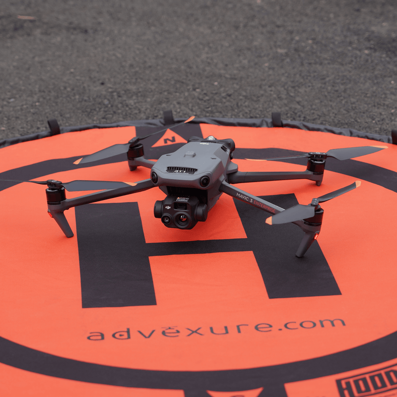 The DJI Mavic 3 Thermal (M3T) drone on top of a Hoodman landing/launch pad readying for takeoff